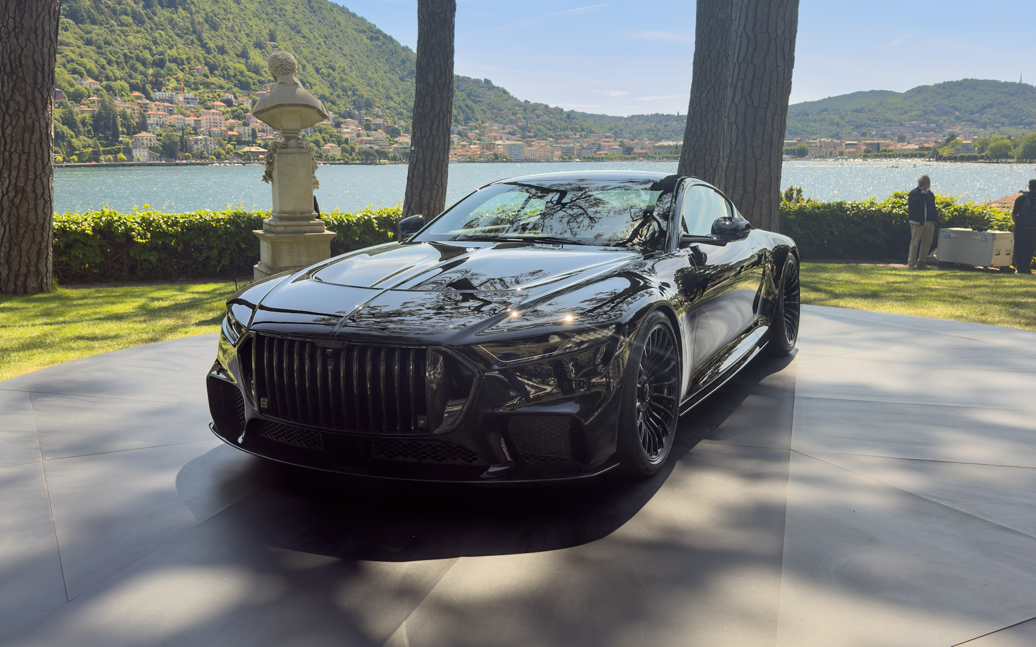 Brabus Bodo, a coachbuilt V12, on its plinth above the lake
