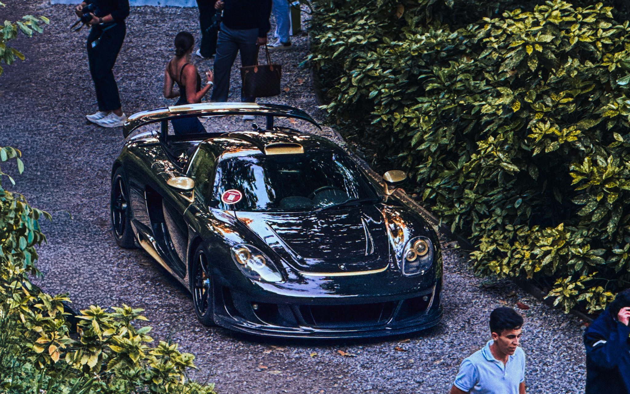 Gemballa Mirage GT in metal-flake rainbow under the trees