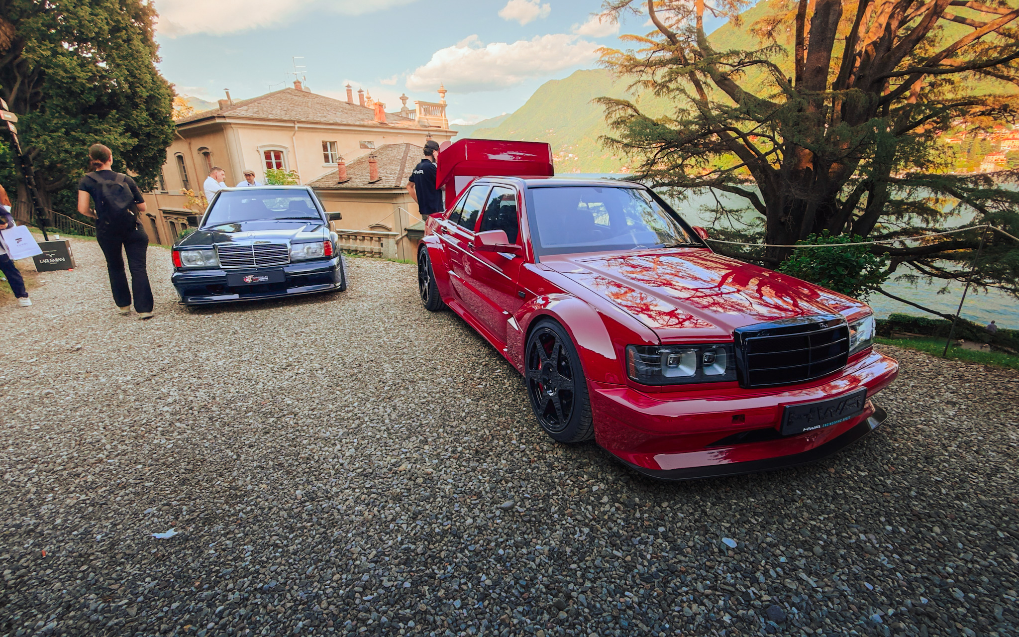 Red HWA EVO beside the original 190E 2.5-16 EVO